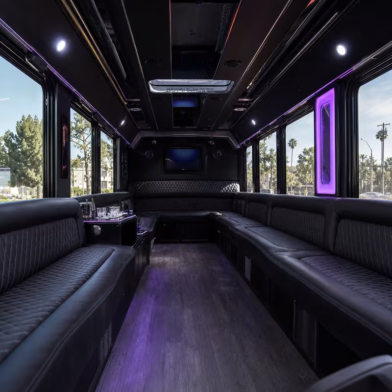Friends laughing during a Phoenix party bus celebration
