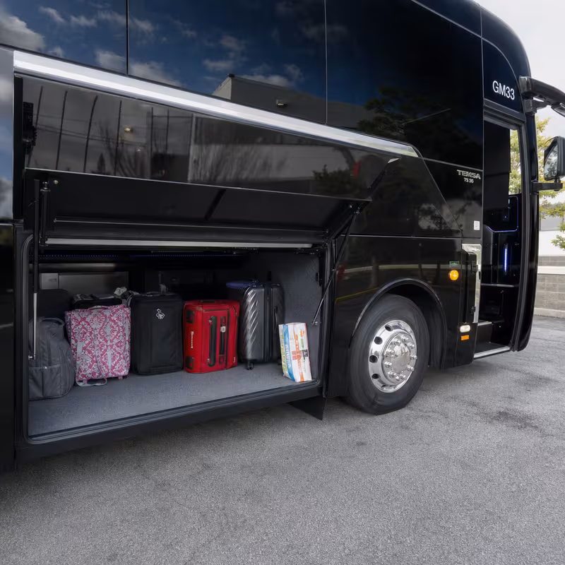 Party bus interior with wraparound leather seating and LED lighting in Phoenix