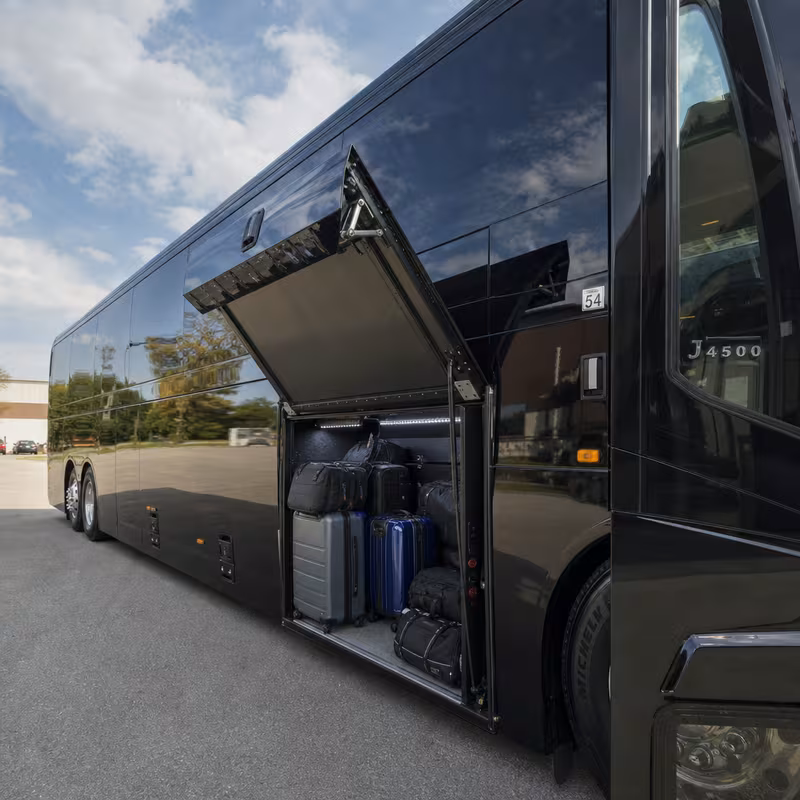 Party bus interior with wraparound leather seating and LED lighting in Phoenix